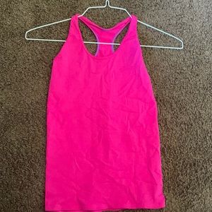Size 14 girls blue Ivivva tank worn once like new.